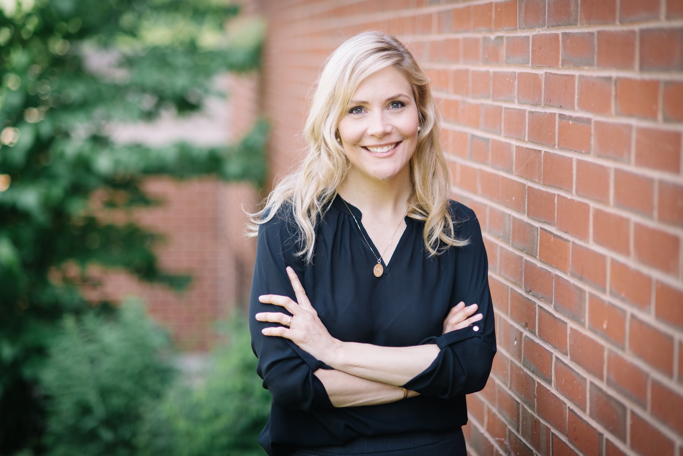 Dr. LeeAnne Cote smiling outdoors